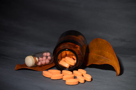 pharmaceutical dark concept with special pillsの写真素材
