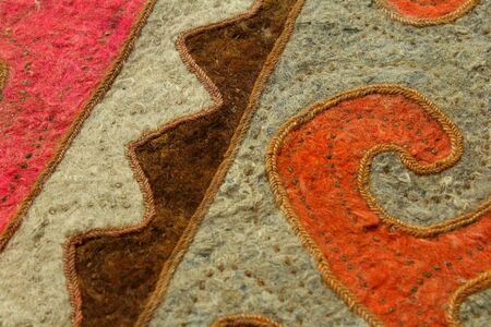 Kyrgyz national carpet shyrdak on the floorの写真素材