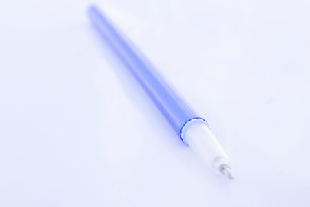Blue pen on the white 1