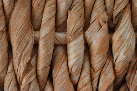 Rattan background with a wooden textureの写真素材