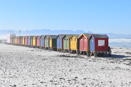 Colorful bathing cabins on the beach in Muizenberg in Cape Town, South Africaの写真素材