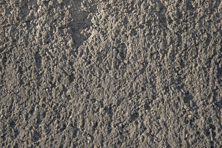Grey wall texrute. Rouch concrete background. Old cement surface textured.の写真素材