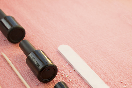 Top view of manicure and pedicure equipment isolated on pink background with copy space.の写真素材