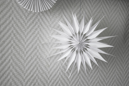 Beautiful handmade white paper flowerの写真素材