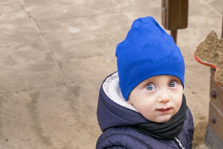 Little child gaming on playgroundの写真素材