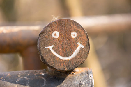 Smiling face on round metal constructionの写真素材