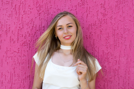 Lovely smiling woman with delicate make-upの写真素材