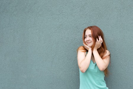 Happy red hair girlの写真素材