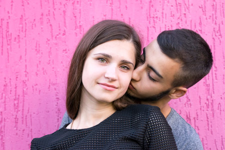 Sweet lovers posing indoors