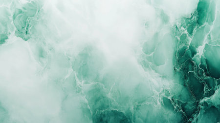 Abstract marble background in shades of green and white, with swirling textures and intricate vein details, giving a sense of natural eleganceの素材