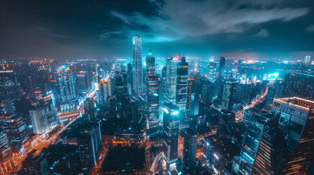 A bustling metropolis at night with illuminated skyscrapers rising into the darkness, creating a dazzling display of urban lights and energy.の素材