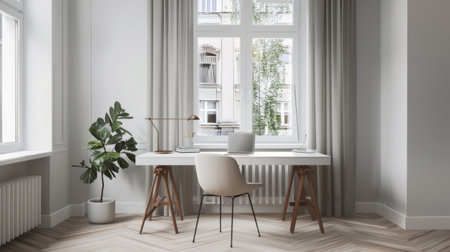 A minimalist home office with a sleek white desk, a comfortable chair, and a large window letting in natural light.の素材
