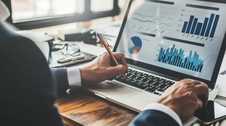 A financial advisor discussing investment strategies with a client, using business graphs and charts to illustrate opportunitiesの素材