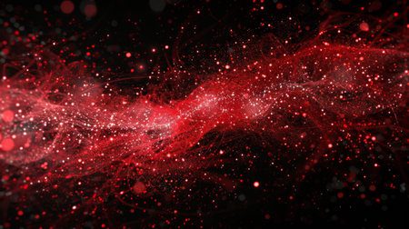 Red sparks scattered on a black backgroundの素材