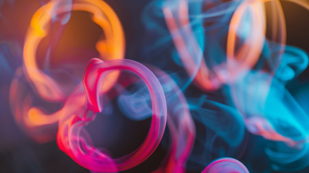 Close-up of colorful smoke rings floating in the air, created by a person vaping with flavored e-liquidの素材