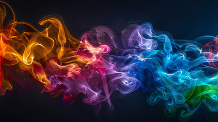 Abstract pattern of colorful cigarette smoke captured against a black background, resembling art in motionの素材