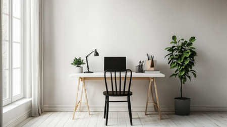 A minimalist home office with a simple desk, chair, and a laptop, surrounded by white walls.の素材