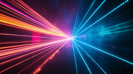 A detailed view of a laser light show with vivid, shifting colors and beams, creating a dramatic and vibrant effect in the night sky.の素材