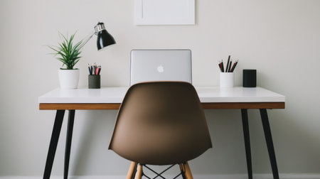 Close-up of a minimalist home office with a sleek desk, ergonomic chair, and minimalistic decor, focusing on a clean workspaceの素材