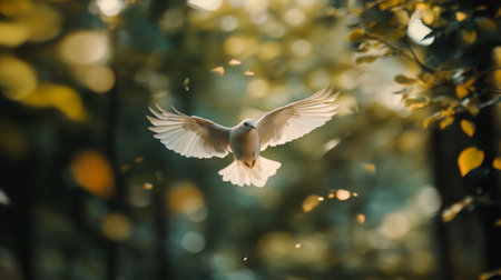 Detailed shot of a bird flying through a forest, with trees and leaves creating a natural backdropの素材