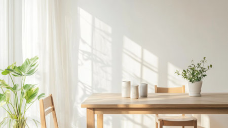 A bright, airy dining area with a simple wooden table, minimalist chairs, and a few potted plants, capturing the essence of understated elegance.の素材