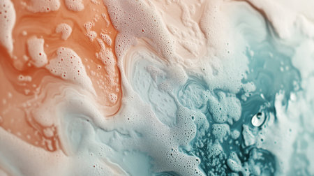 Close-up of an abstract background with fluid, organic shapes and subtle textures, blending soft and vibrant colors for a harmonious and artistic look.の素材