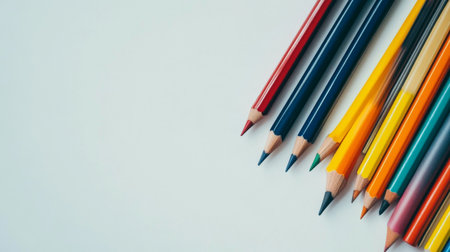 A vibrant arrangement of colored pencils on a clean white background, perfect for art, education, and creative projects. Ideal for showcasing creativity.の素材