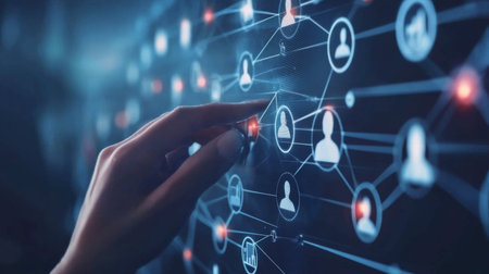 A hand interacts with a digital interface showcasing user connections and data flow, symbolizing modern networking and digital communication.の素材