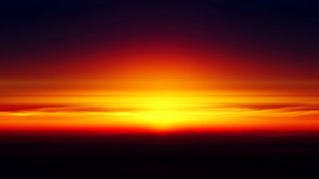 A stunning sunset displaying an array of vibrant colors across the sky, blending orange, red, and blue. This serene view captures the beauty of nature at dusk.の素材