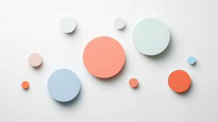This image features an abstract arrangement of colorful circles on a white background. Ideal for modern design projects, it embodies creativity and minimalism.の素材
