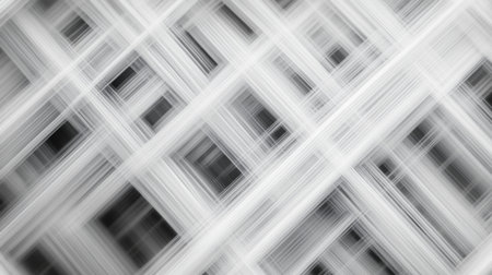 This abstract image features a dynamic geometric pattern in black and white, emphasizing motion and depth through blurred lines, perfect for creative projects.の素材