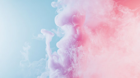 Slow-motion capture of pastel-colored smoke rising and dispersing in a soft, ethereal manner against a light backdropの素材