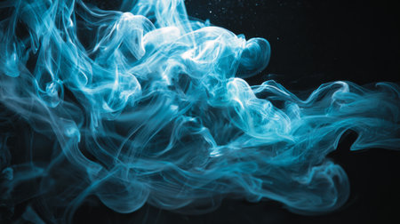 Captivating blue smoke swirls create an enchanting atmosphere against a dark backdrop. This abstract image evokes mystery, beauty, and fluid motion, perfect for artistic projects.の素材