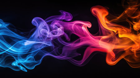 An artistic image of colorful smoke swirling against a black background, used for creative photography, emphasizing movement and fluidity in a captivating way.の素材