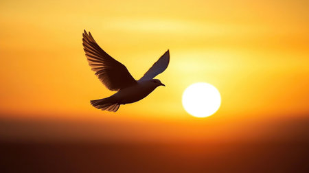A graceful bird soars through a golden sunset, showcasing the beauty of nature and the sense of freedom it brings. Perfect for nature lovers.の素材