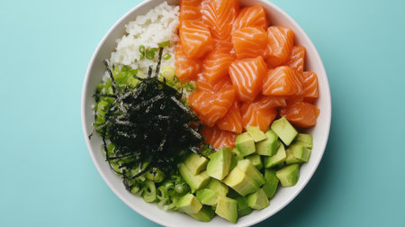 A vibrant sushi bowl featuring fresh salmon, creamy avocado, white rice, and crunchy seaweed. Perfect for a healthy and delicious meal.の素材