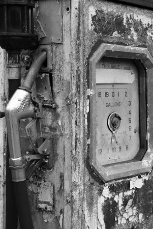 Black and white shot of an abandoned fuel pumpの写真素材