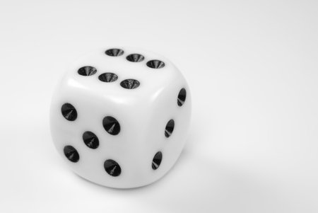 Single die showing a six isolated on white