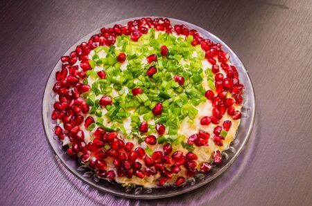 Healthy salad of fresh vegetables and pomegranate seedsの写真素材