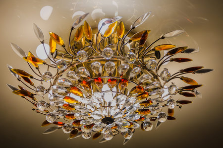Beautiful and dear modern chandelier in living roomの写真素材