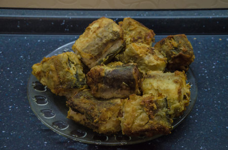 Slices of fried fish on a plate