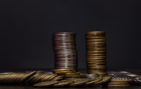 Euro coins. Euro money. Euro currency.Coins stacked on each other in different positions. Money concept.の写真素材