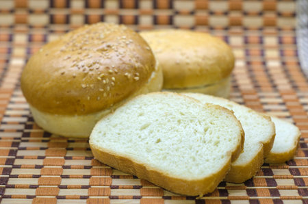 Hamburger bun with different fillings, assorted on a beautiful background.