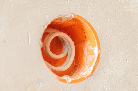 Putty and preparation of internal outlets on the wall.の写真素材