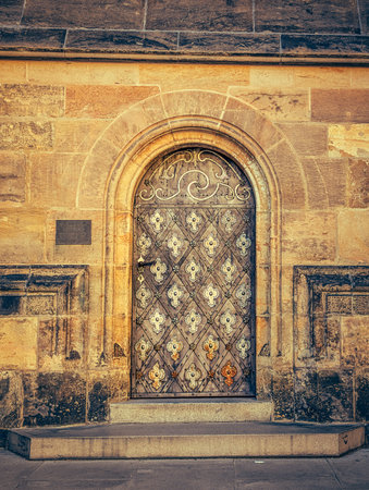 A collection of artistic photographs capturing old European doors. Each doorway reflects the spirit of past centuries through carved wood, ornate metalwork, stone framing, and symbolic inscriptions. These doors embody history, culture, and craftsmanship, representing the architectural heritage of Europe.の写真素材