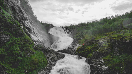Waterfall near the Flåm railway with the dancing lady