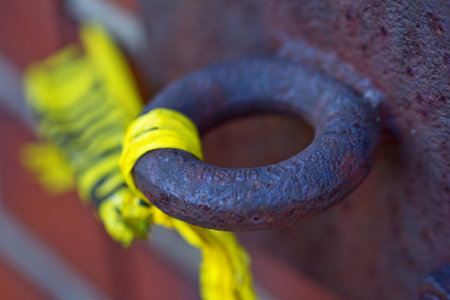 Rusty ring on the side of an old factory