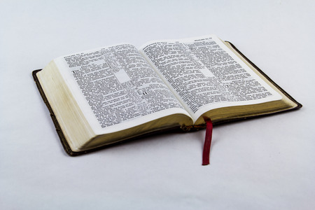 Open King James bible on a white backgroundの写真素材