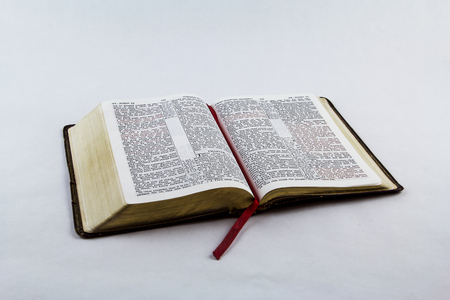 Open King James bible on a white backgroundの写真素材
