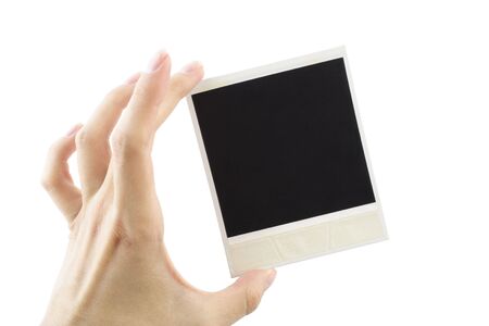 Photoin a hand isolated on whiteの写真素材